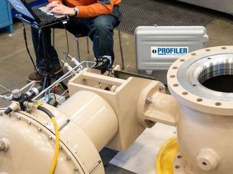 Large vacuum valve on the workshop bench during leak testing